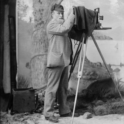 Photographer Richard Maynard with Field Camera on Tripod Inside Hannah Maynard